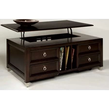 a coffee table with drawers and a bowl on top