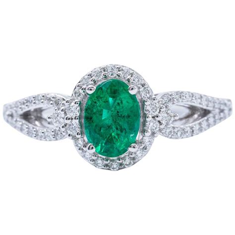 Oval Shape Emerald and Diamond Halo Engagment Cocktail Ring For Sale at 1stDibs