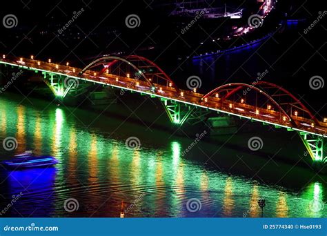 Arch bridge at night stock photo. Image of scene, urban - 25774340