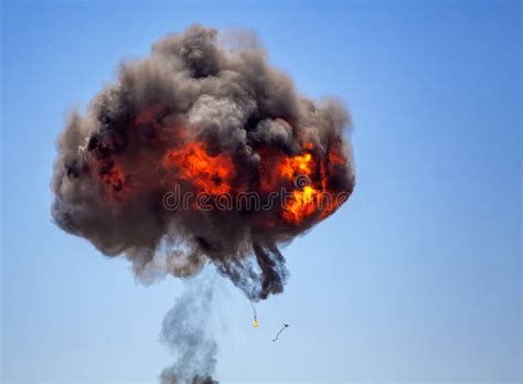 Ball of Fire and Column of Smoke from a Muntions Explosion Stock Photo - Image of destruction ...