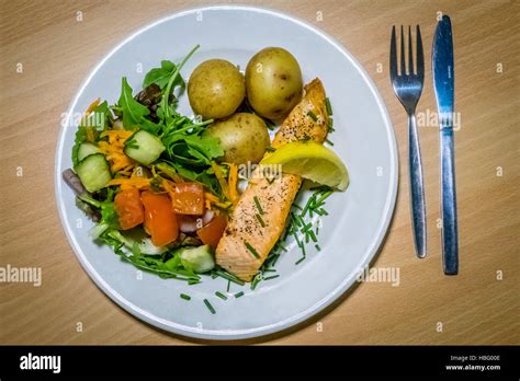 Roast salmon main course Stock Photo - Alamy