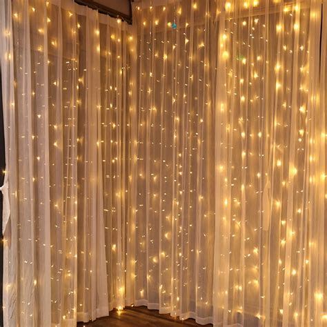 TORCHSTAR 9.8ft x 9.8ft LED Curtain Lights, Starry Christmas String Light, Icicle light, Fairy ...