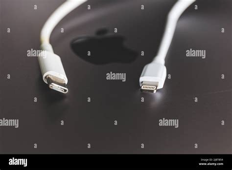 Apple charger and USB Type C charger Stock Photo - Alamy