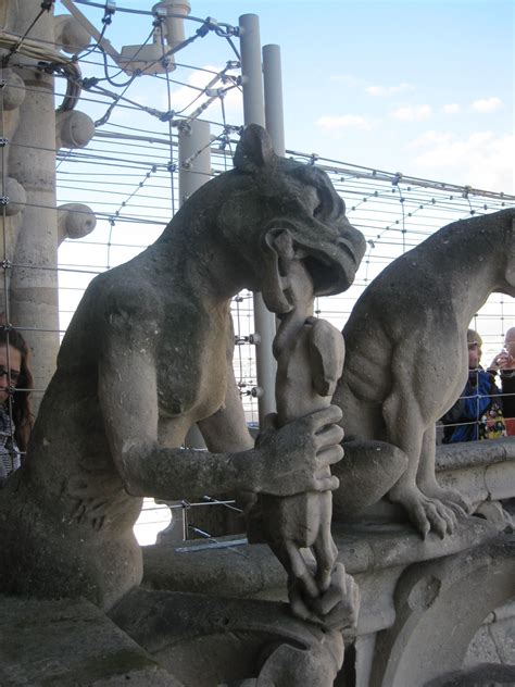 Gargoyle atop of Notre-Dame Cathedral of Paris. | Statue, Gargoyles ...