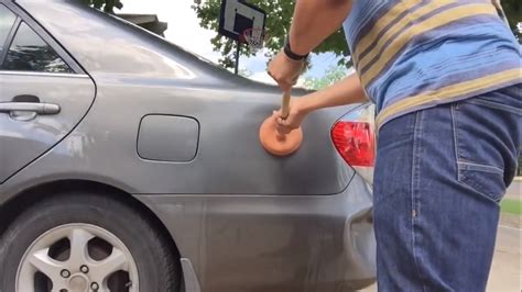 DIY Auto Body Hacks: Fix a Car Dent by Pouring Hot Water Over It - SolidSmack