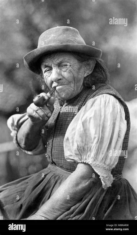 Woman smoking pipe Black and White Stock Photos & Images - Alamy