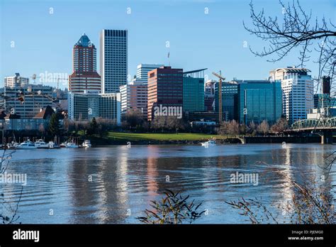 Portland cityscape with Tom McCall Waterfront Park on the Willamette River. Portland, Oregon ...