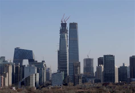 Beijing districts to cap population in bid to tackle smog, congestion ...