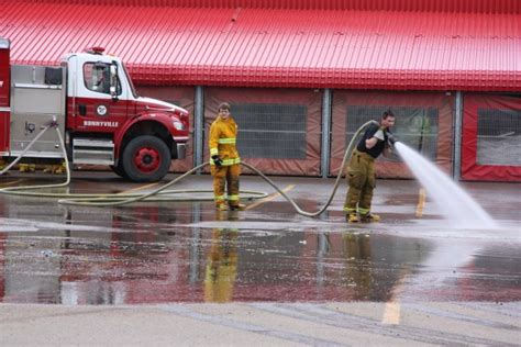 Fireman Hose Washing Firetruck Free Stock Photo - Public Domain Pictures