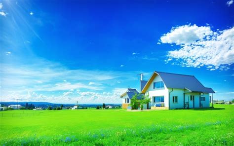 Premium Photo | A house in a field with a blue sky and clouds wallpaper