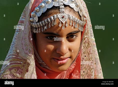 Omani girl in traditional dress with jewelry, Nakhl, Batinah Region ...