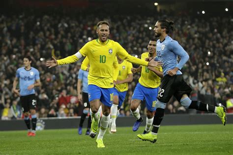 Brazil 1-0 Uruguay: Neymar penalty seals fiery Emirates Stadium victory ...