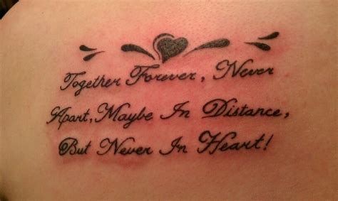 a woman with a tattoo on her back that says together forever, never forget about maybe for ...