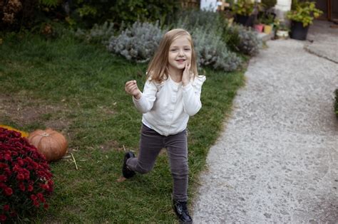 Premium Photo | Child playing outdoors in summer