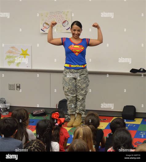 U.S. Army Reserve Staff Sgt. Claudia Martinez shows children at Kinder Ranch Elementary, in San ...