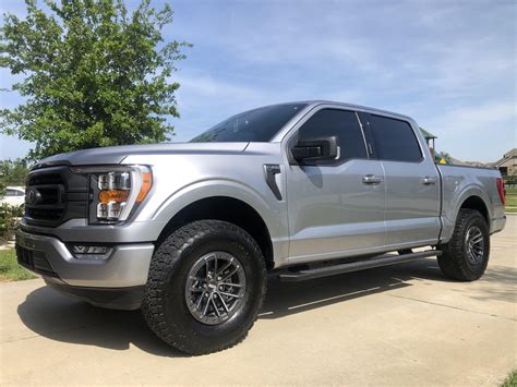 Leveled 2021 Sport on 34s and factory Raptor wheels | F150gen14 -- 2021+ Ford F-150, Tremor ...