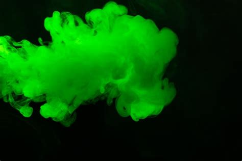 Premium Photo | Green steam on a black background