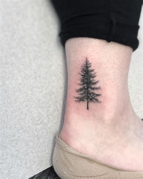 Update 84+ evergreen tree tattoo best - in.cdgdbentre