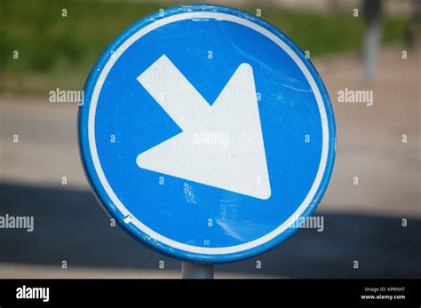 Traffic sign arrow right Stock Photo - Alamy