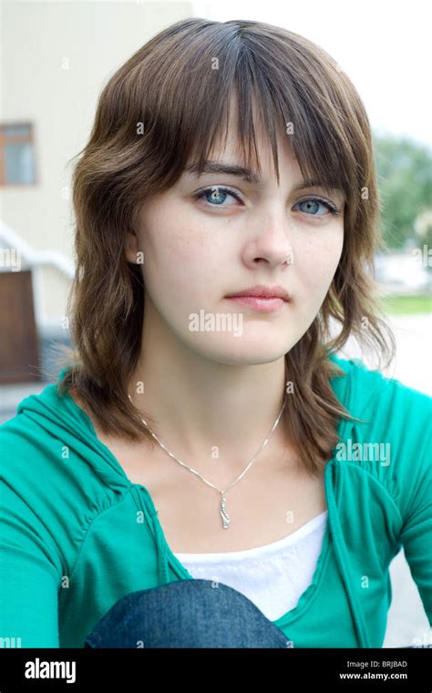 young beautiful european girl looks sadly into camera Stock Photo - Alamy