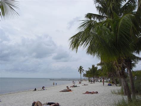 Smathers Beach Key West on a warm cloudy afternoon. | Key west beaches, Smathers beach key west ...