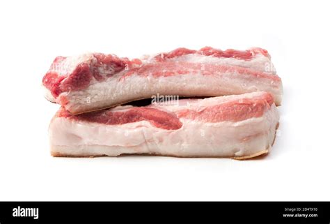 Fresh pig meat with layers of fat isolated on a white background Stock ...