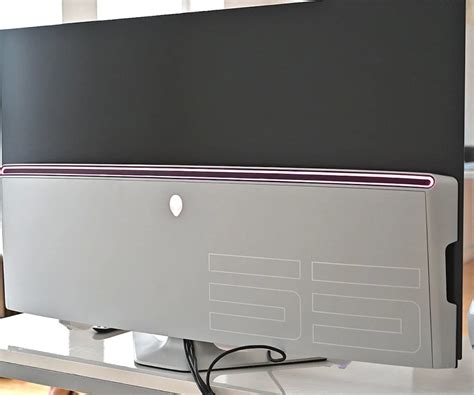 You'll Never Want to Leave the Dell Alienware 55 OLED Gaming Monitor