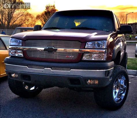 2005 Chevrolet Silverado 1500 with 20x12 -44 Moto Metal MO962 and 305/55R20 Nitto Terra Grappler ...