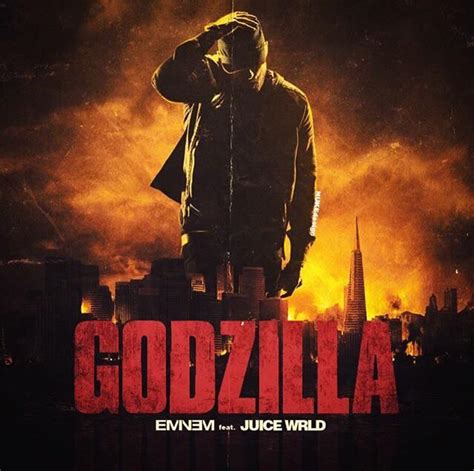 the movie poster for godzilla, featuring a man standing on top of a building