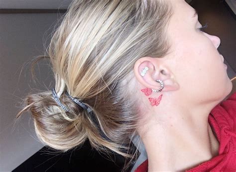 a woman with ear piercings on her ears