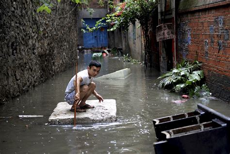 Flooding In Southern, Central China Kills At Least 15 People, Thousands Displaced As More Rain ...