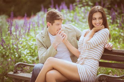 Romance in the Park stock photo. Image of happiness, flirting - 55374690