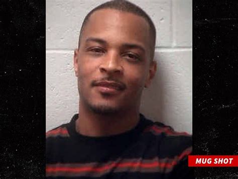 Rapper, T.I. smiles in mugshot after getting arrested in front of the ...