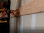 Easy DIY Wall Mounted Folding Table Workbench from a Door | Remodelaholic