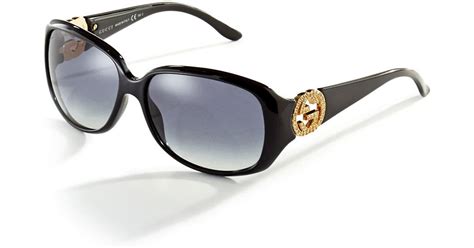 Gucci Logo Accented Sunglasses in Black | Lyst