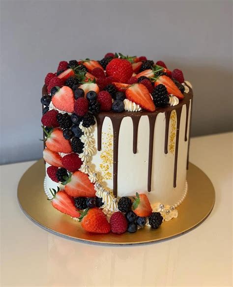 Gorgeous assembly of fresh summer fruits with a delicate tower around ...