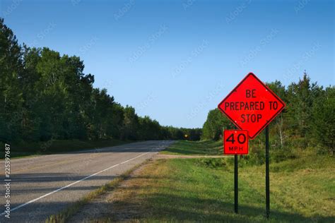 Orange Warning Road Signs on highway at construction site Stock Photo ...