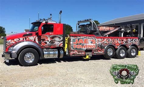 custom tow truck wraps - Arron Echevarria