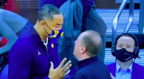 Juwan Howard throws punch during postgame handshake line after loss at Wisconsin