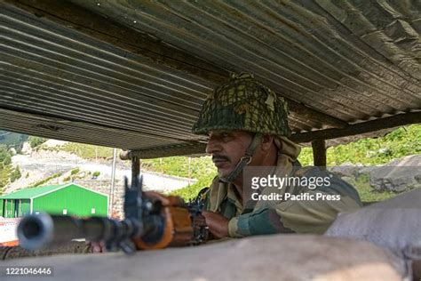 Border Security Force personnel keeps vigil at a checkpoint along a... News Photo - Getty Images