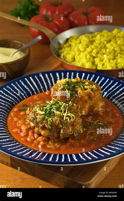 Ossobuco with saffron risotto Italy Food Stock Photo - Alamy