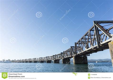 Tauranga Harbour with Steel Railway Bridge Crossing Stock Photo - Image of scenic, tauranga ...