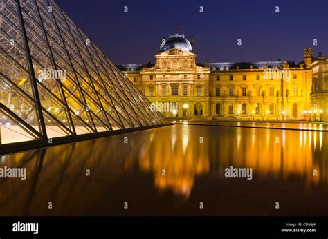 Louvre Palace and Pyramid at night, Louvre Museum, Paris, France Stock ...