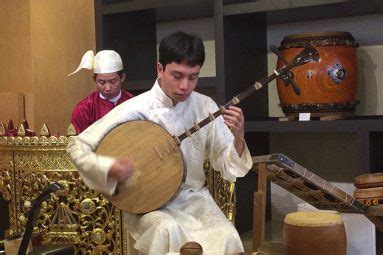 Vietnamese Traditional Instrument Dan Nguyet - Vietnam Vacation