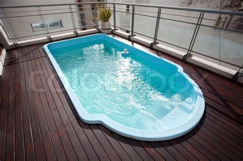 Conex Box Home Interiors | Stock image of 'Blue swimming pool on the ...