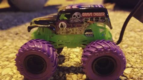 Unboxing Grave Digger purple tire treads monster truck in Toys R Us ...