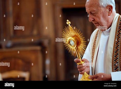 The Blessed Sacrament in a monstrance. Eucharist adoration. France ...