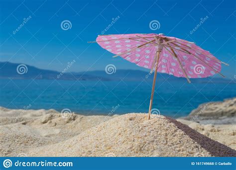 Parasol in the Sand of the Beach Stock Photo - Image of tourism, coast: 161749668