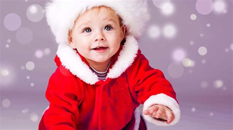 Smiley Cute Baby Boy Is Crawling On Floor Wearing Santa Dress In Bubbles Background HD Cute ...