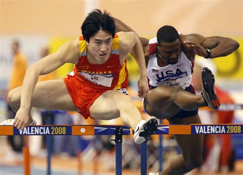 Liu Xiang wins gold in men's 60m hurdles at indoor worlds